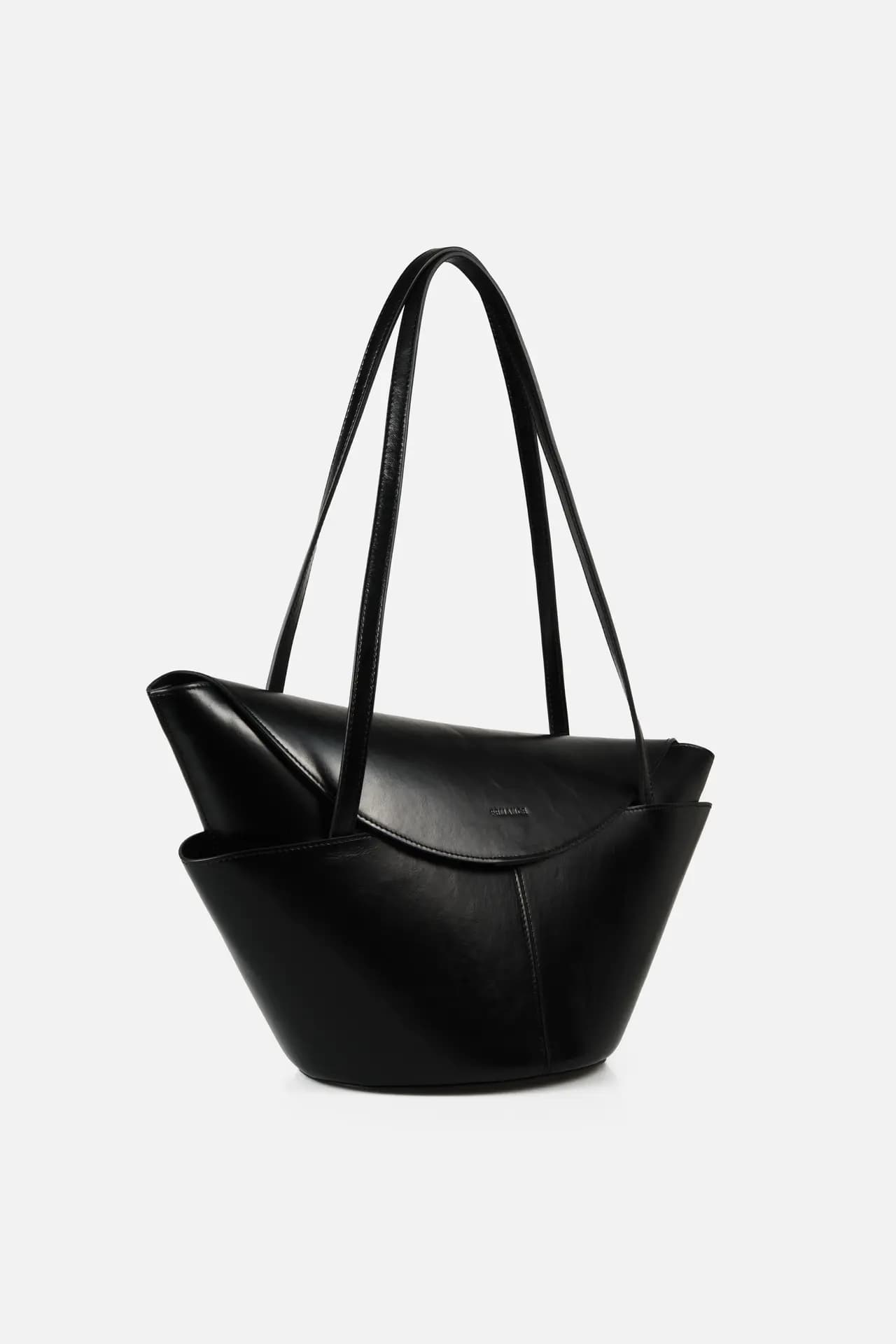 An angled image of FEMANCE Lympia Black handbag